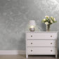 Silver Sand decorative paint in Black 2 shade with a wind-blown sand textured pearlescent finish on a wall