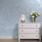 Silver Sand decorative paint in Navy Blue 2 shade with a wind-blown sand textured pearlescent finish on a wall