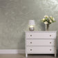 Silver Sand decorative paint in Umbra 2 shade with a wind-blown sand textured pearlescent finish on a wall